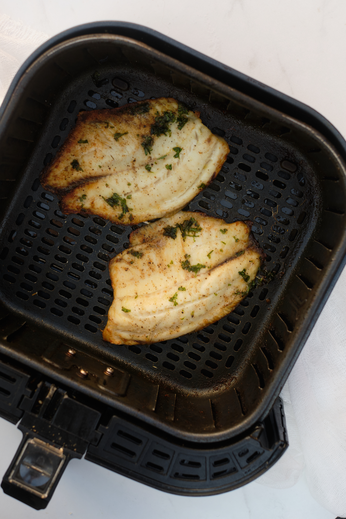 the completed frozen tilapia air fryer recipe