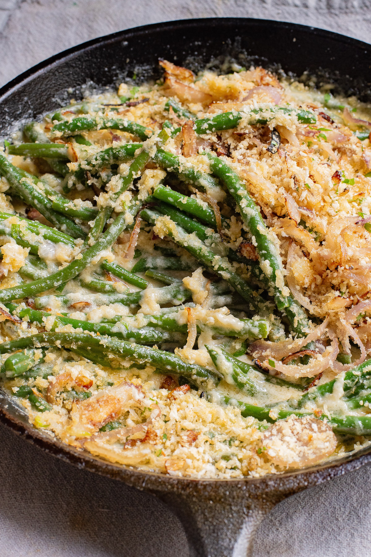 a skillet containing the finished green bean casserole recipe