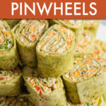 A stack of veggie pinwheels on a plate
