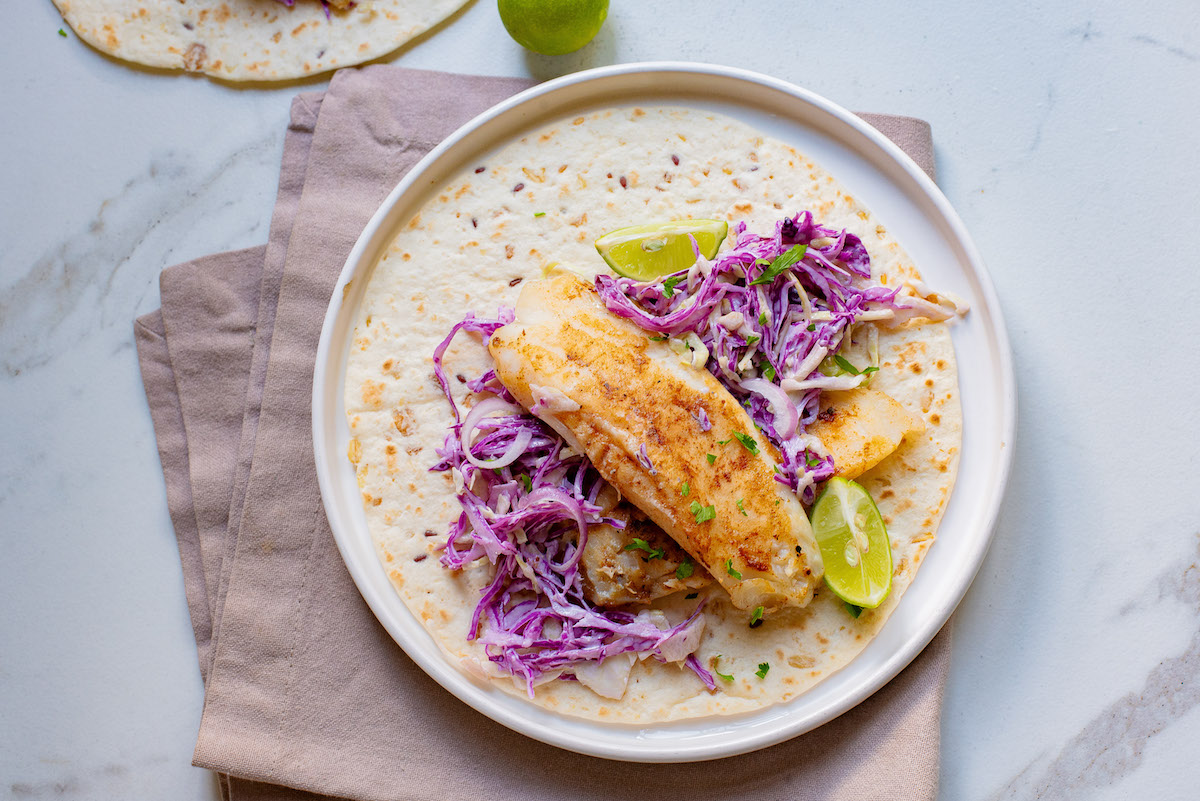 one of the air fryer fish tacos ready to be served
