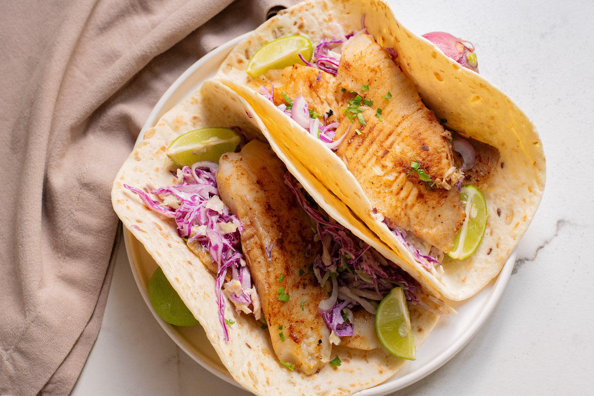 top down view of two air fryer fish tacos