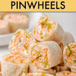 A stack of buffalo chicken pinwheels on a plate.