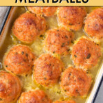 baked chicken meatballs in rows in a casserole dish