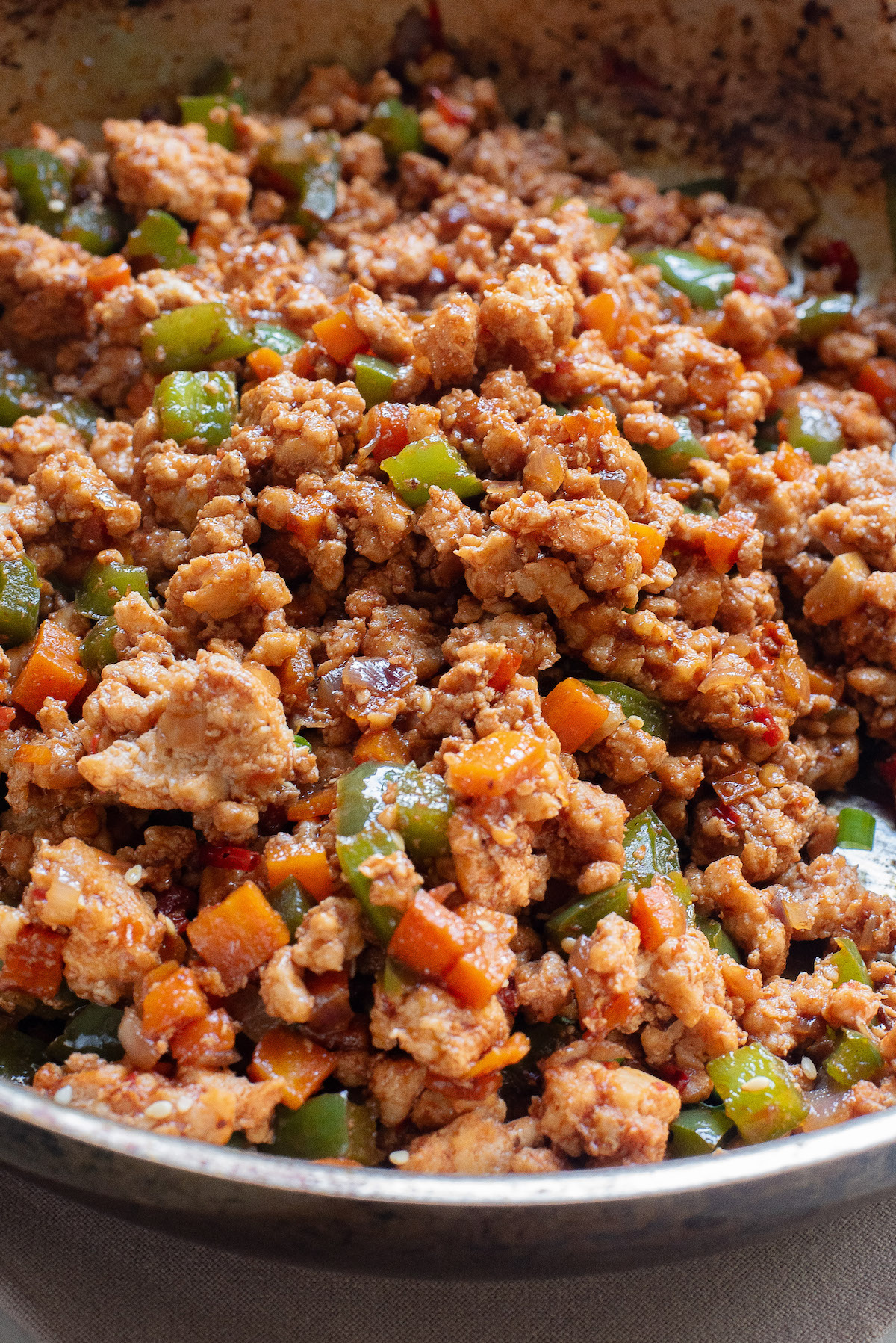 close up of how to cook ground turkey seasoned and inside a skillet