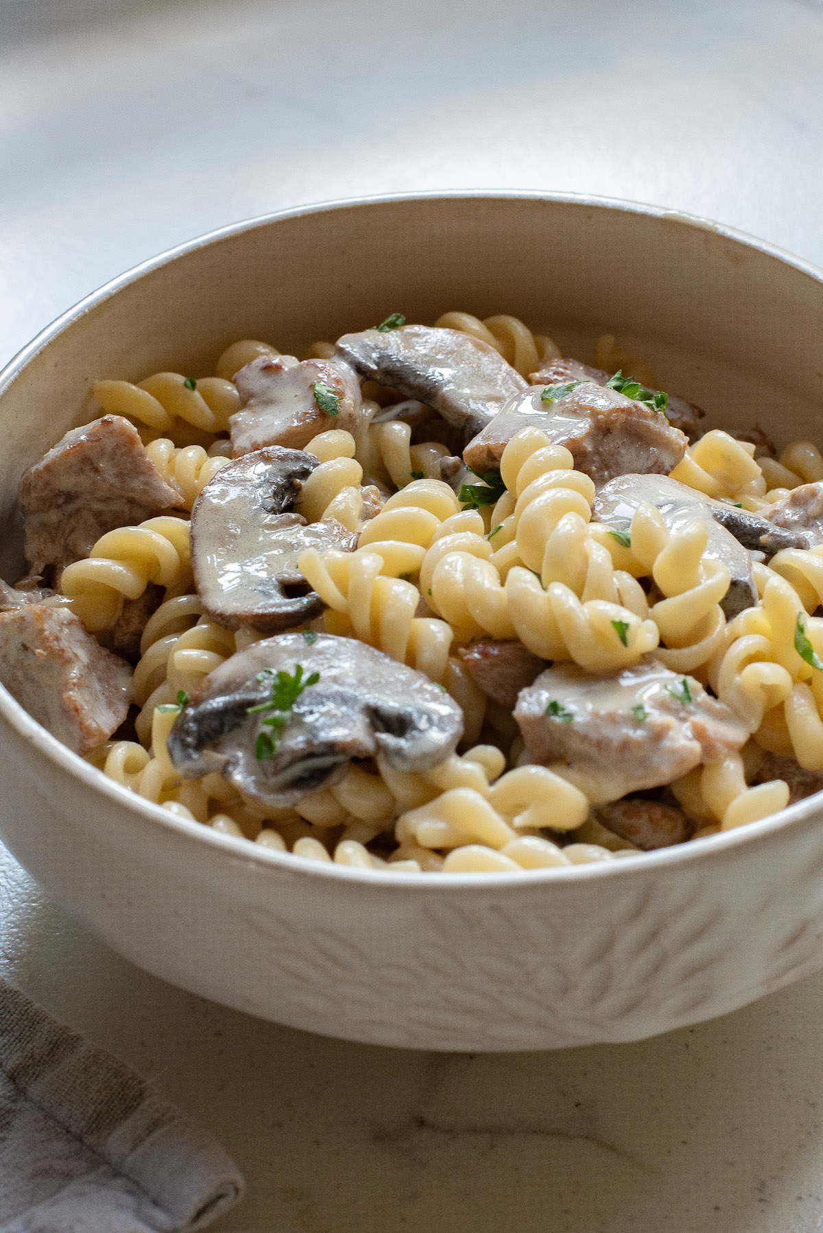 close up of a bowl filled with turkey stroganoff