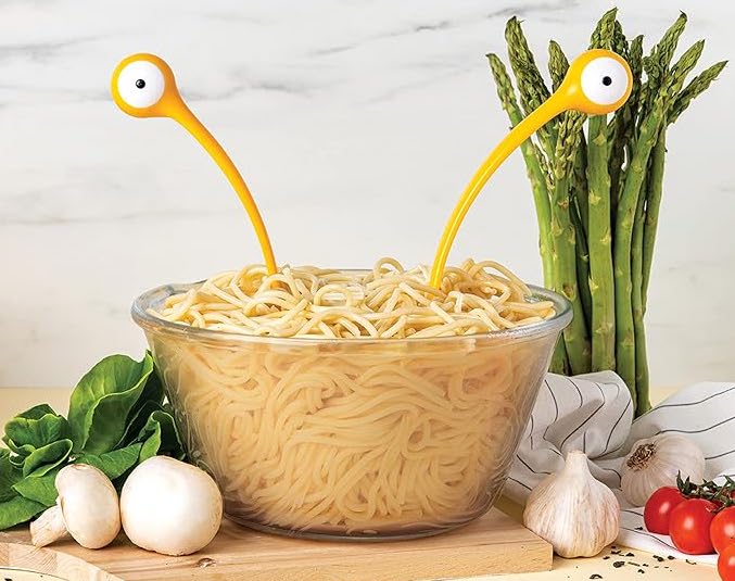 Whimsical monster pasta servers for foodie gift guide. 