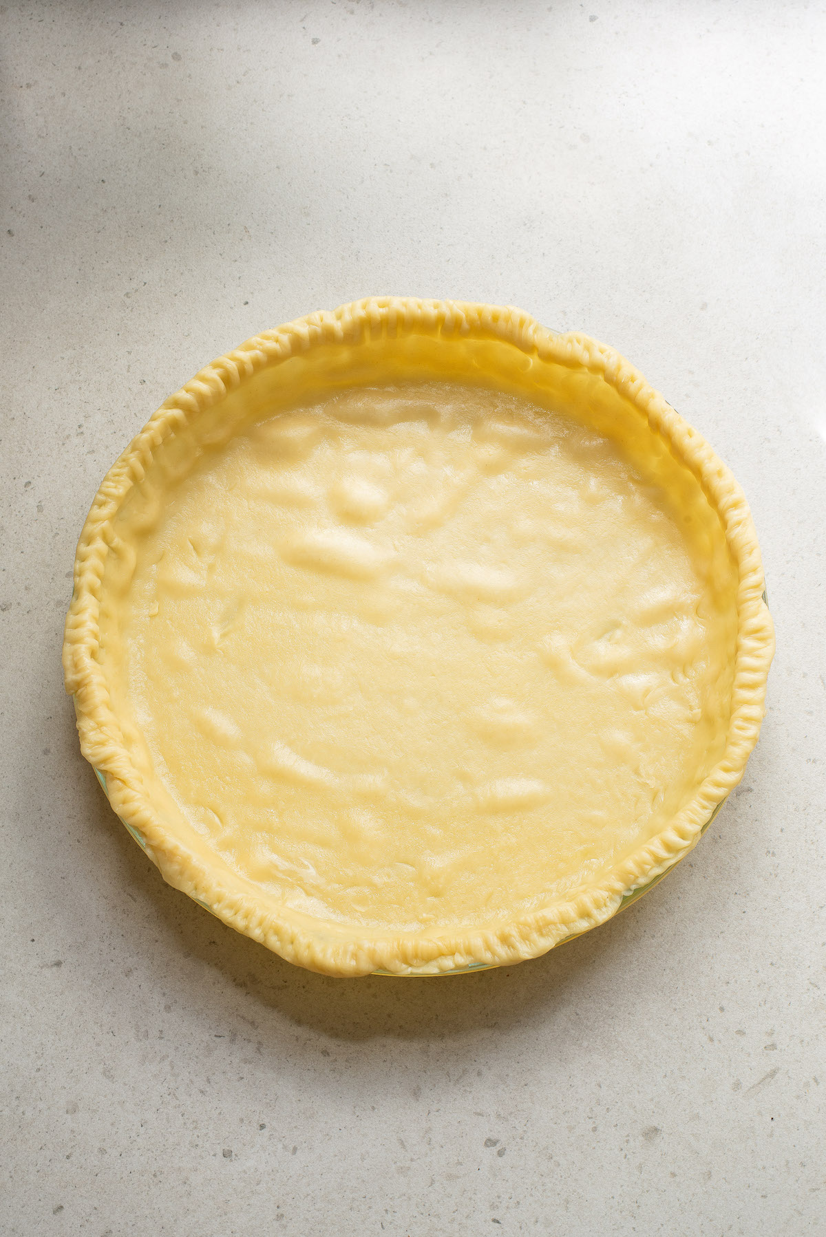 the formed pie crust in a 9-inch pie plate