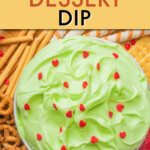 Overhead view of grinch dip surrounded by cookies and pretzels