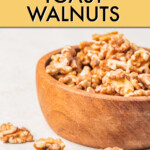 toasted walnuts in a wooden bowl