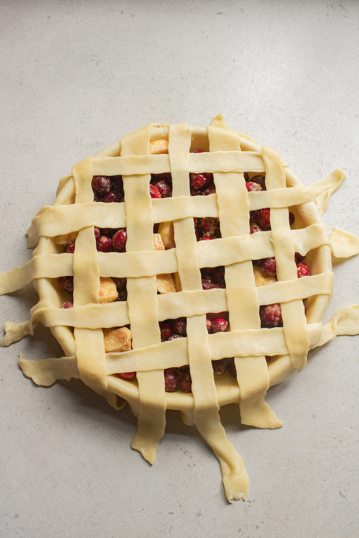 the top crust of the pie being braided into a lattice formation