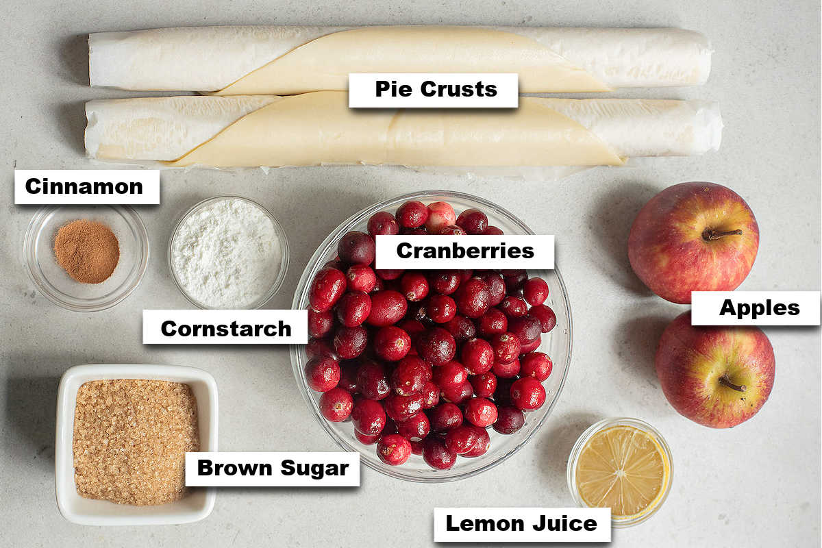 the ingredients needed to make this cranberry pie with apples