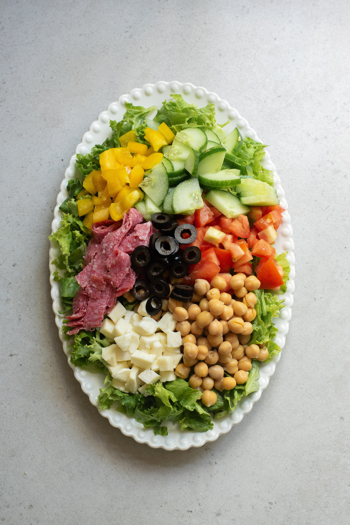 the salad ingredients on a large serving platter