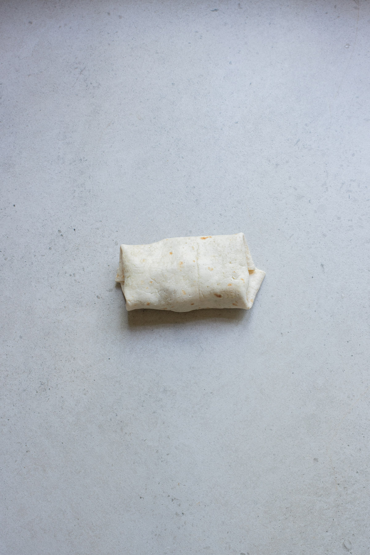 one finished chicken wrap