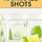 Close up of a shot glass with Kamikaze and a lime