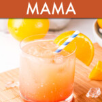 Bahama mama cocktail surrounded by oranges