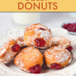 A stack of jelly donuts on a plate