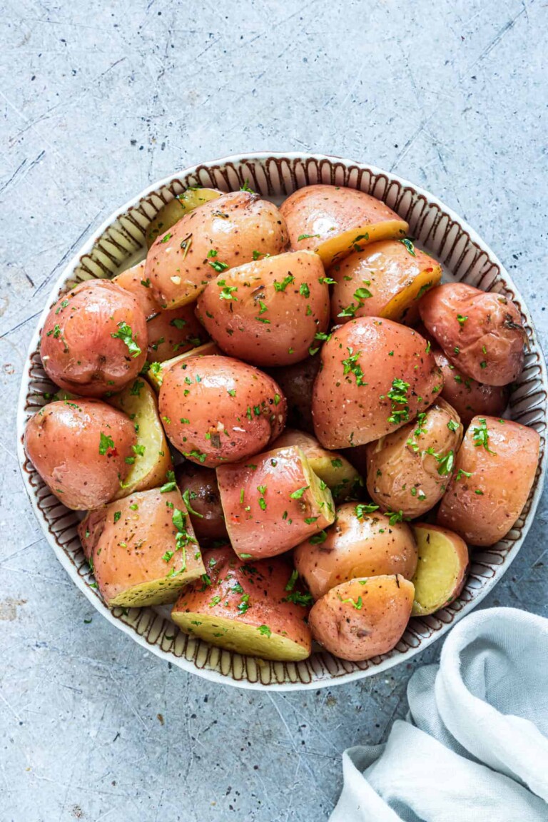 garlic butter Instant Pot Red Potatoes in a bowl.