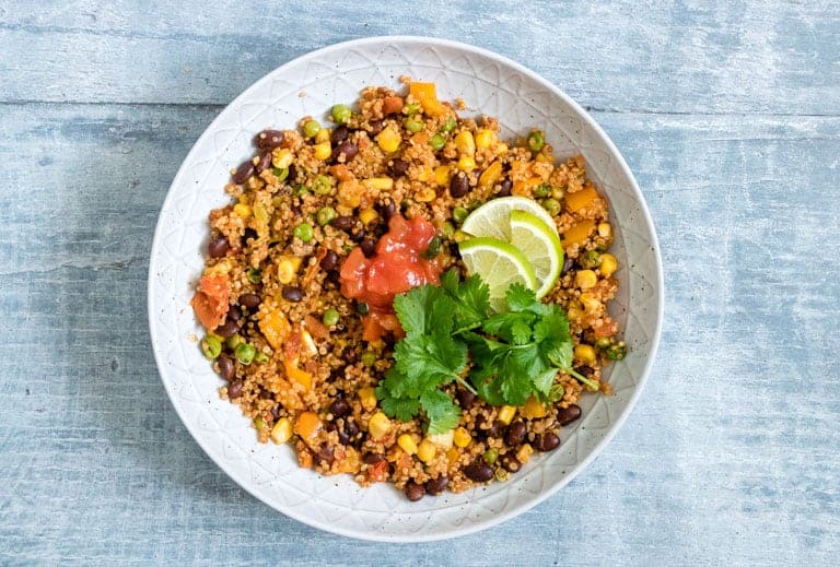 close up view of bowl filled with Dump and Start Instant Pot Mexican Quinoa