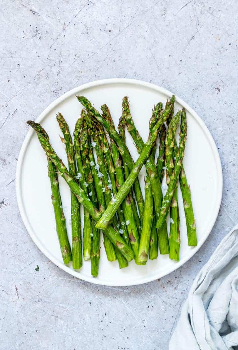 a plate full of air fryer asparagus ready to be served
