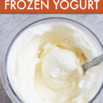 A spoon scooping frozen yogurt out of a jar