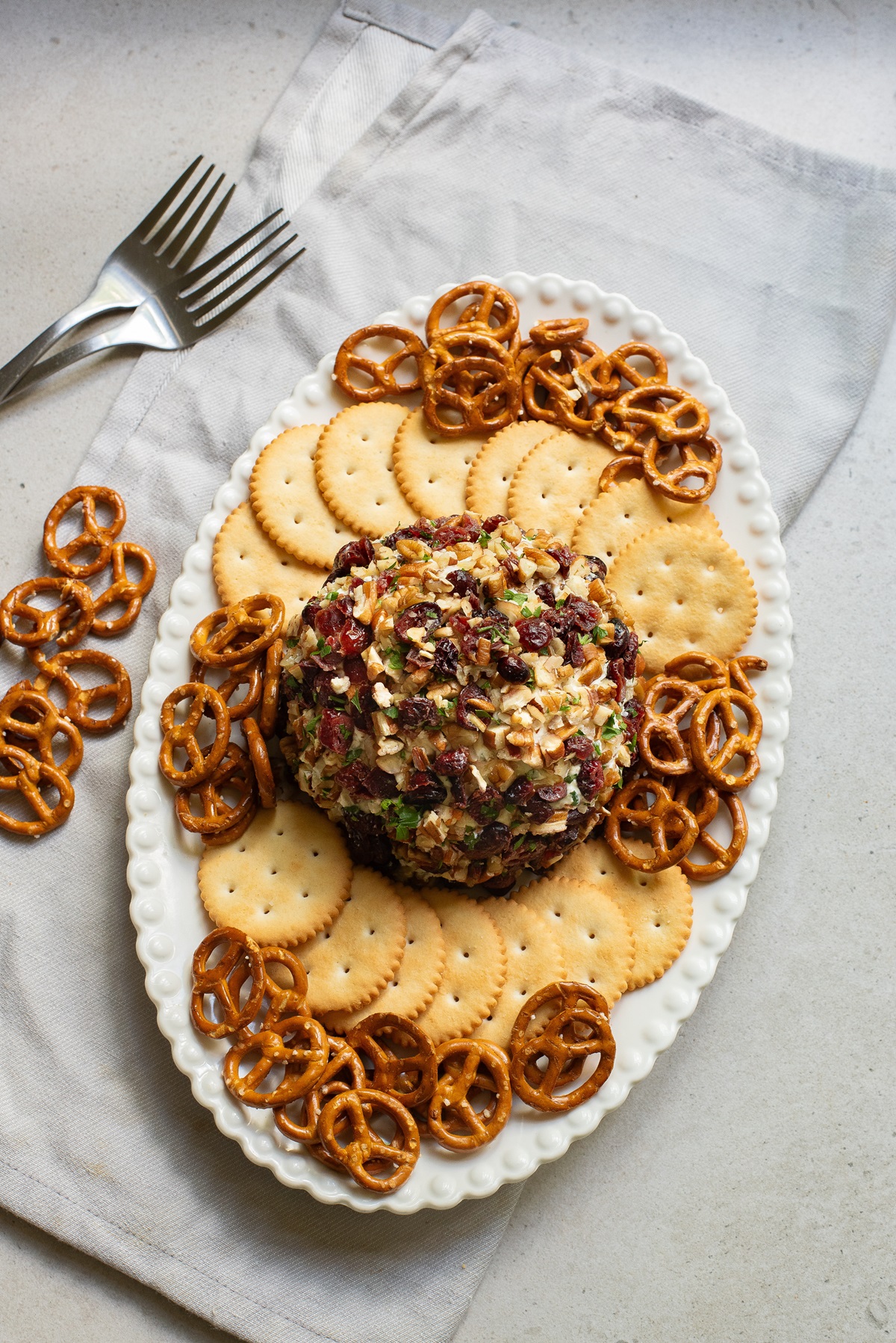 Platter with biscuits, pretzels and cheese.