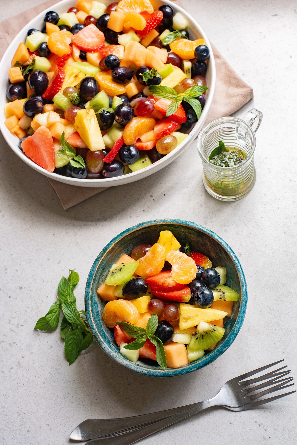 Fruit salad in a serving bowl.
