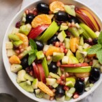 Round bowl with fruit in it.