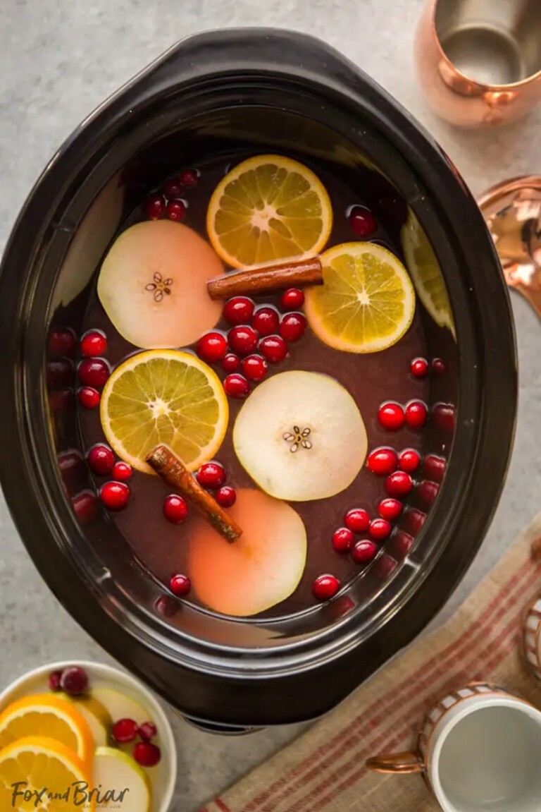 Close up view of crockpot cranberry pear cider.
