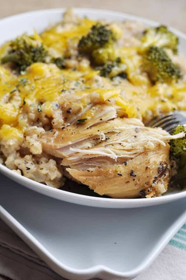 Chicken Divan Crockpot Recipe in a white plate with a fork.