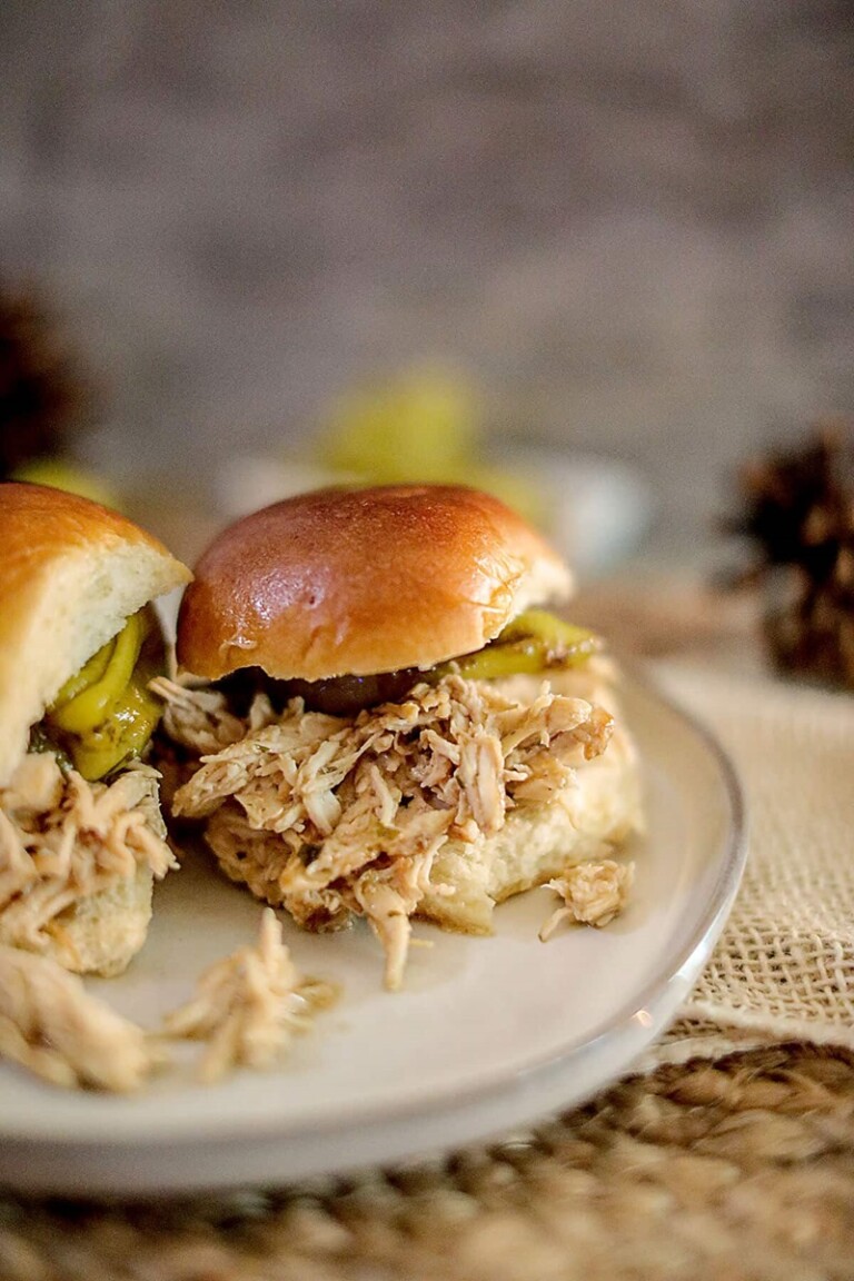 Crock Pot Mississippi Chicken Sliders on a white plate.