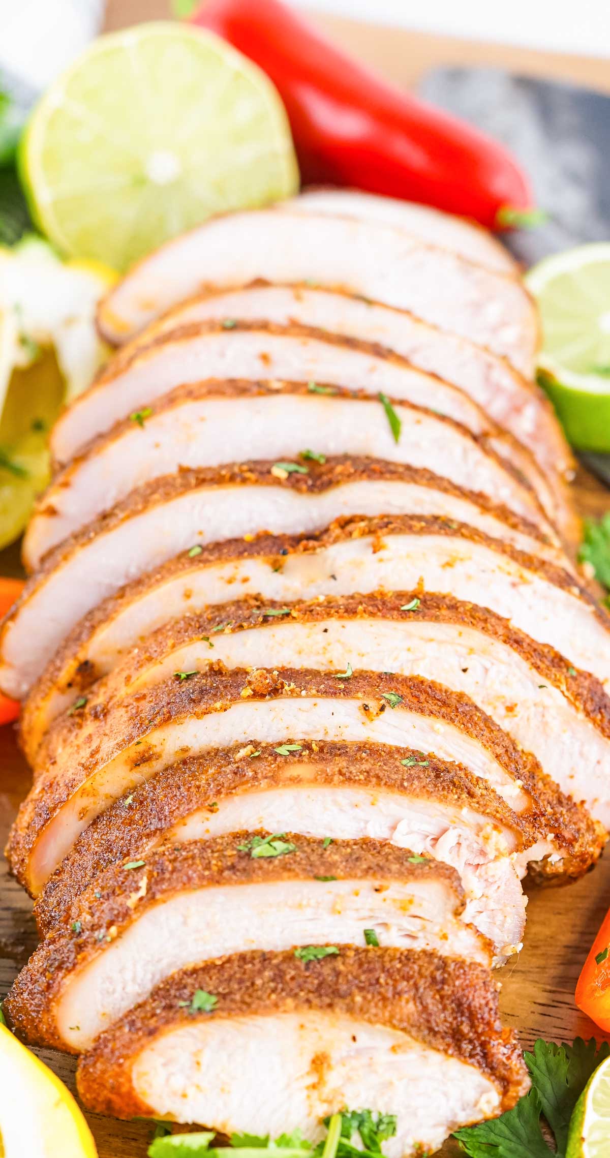 Sliced turkey breast that has been smoked with garnishes.