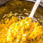 A spoon in the creamed corn.