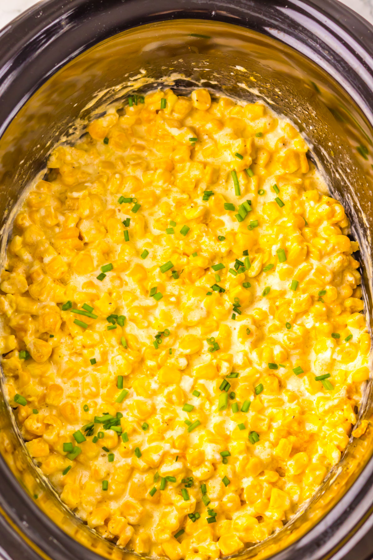 Creamed corn in slow cooker insert.