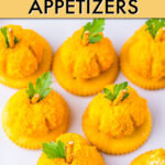 Mini pumpkin cheese balls on crackers
