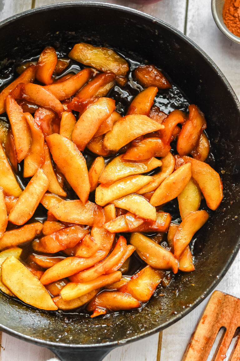 Fried apples in a skillet.